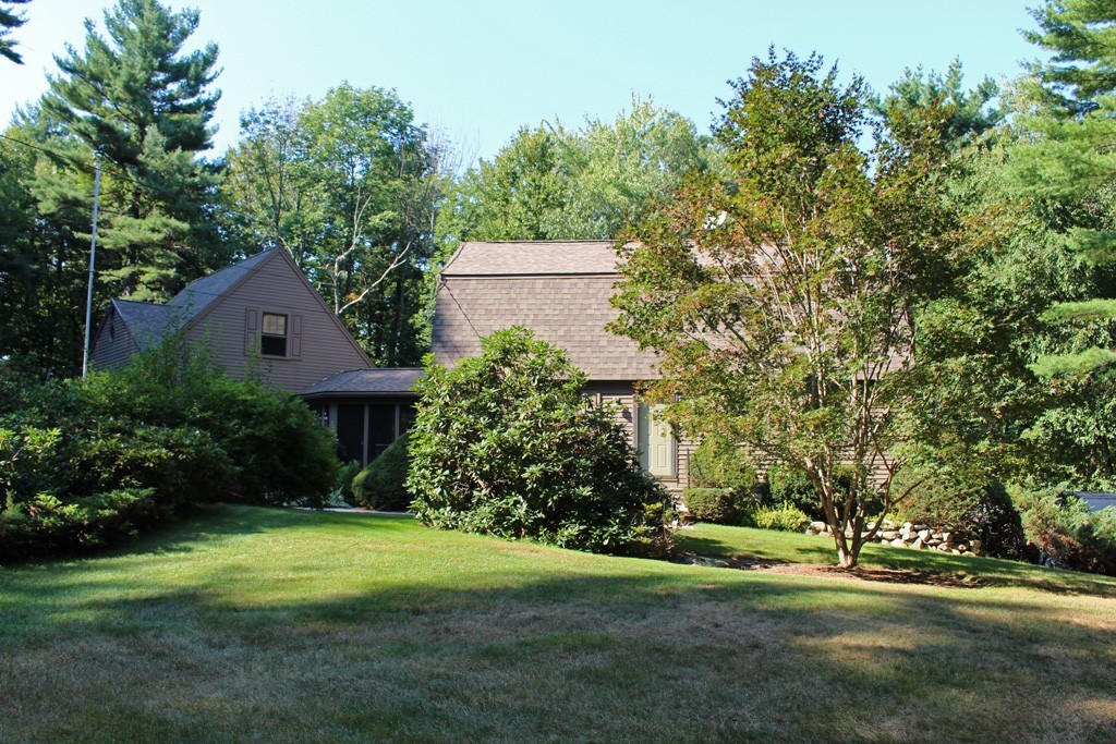 11 Bayberry Hill Road Townsend, MA 01469 - Photo 18 of 21 a front view of a house with a yard and tree s