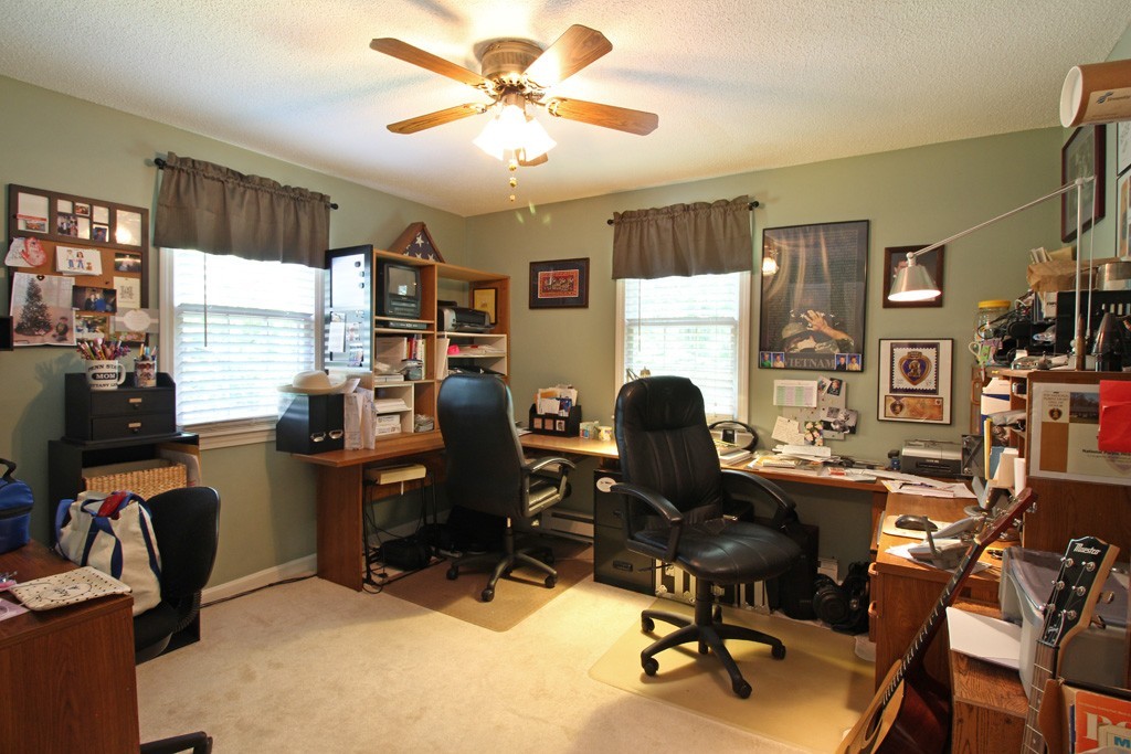 11 Bayberry Hill Road Townsend, MA 01469 - Photo 5 of 21 a view of a workspace with furniture and a window