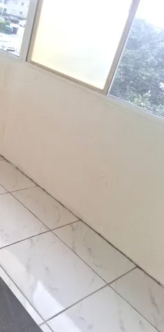 a view of wooden floor and entryway