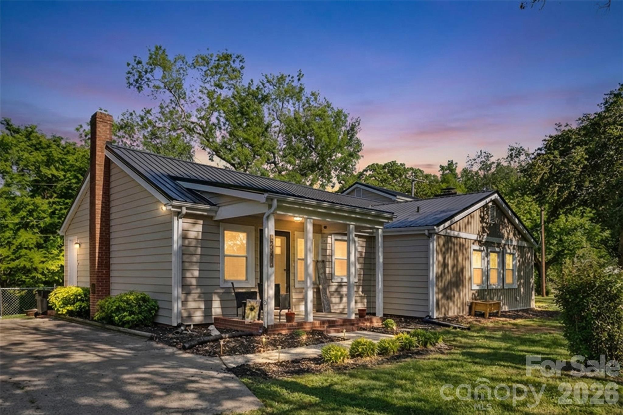 2341 Dixon Road Belmont, NC 28012 - Photo 2 of 42 a front view of a house with a yard