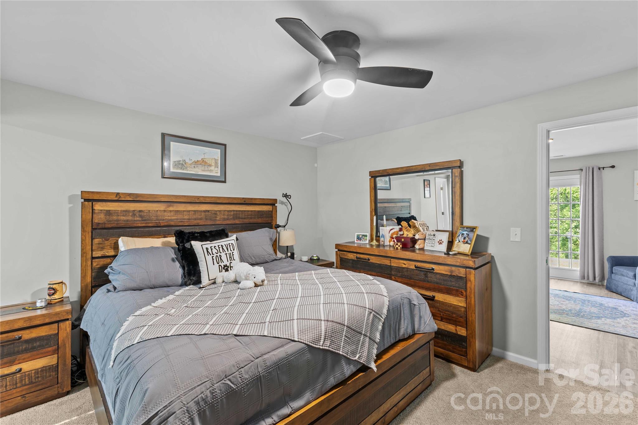 2341 Dixon Road Belmont, NC 28012 - Photo 33 of 42 a bedroom with a bed and a large mirror on the dresser