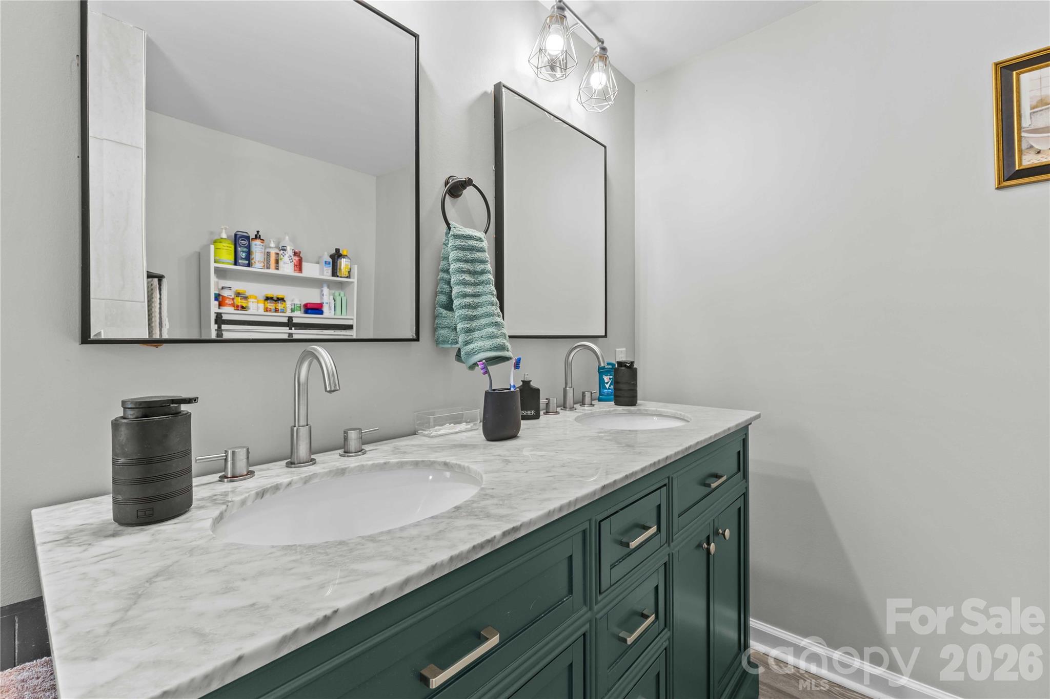 2341 Dixon Road Belmont, NC 28012 - Photo 35 of 42 a bathroom with a granite countertop sink and a mirror