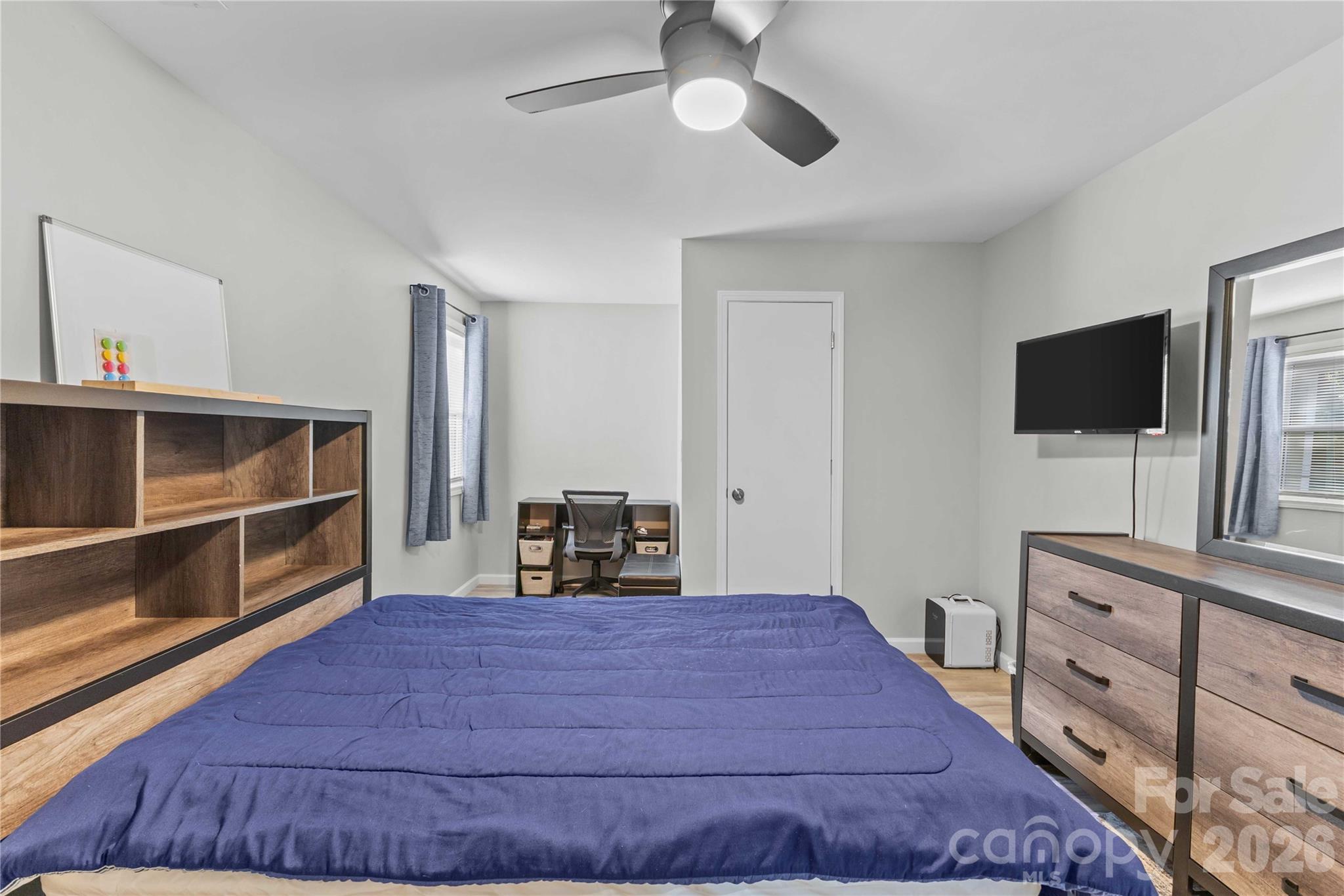 2341 Dixon Road Belmont, NC 28012 - Photo 41 of 42 a bed room with a bed and a television