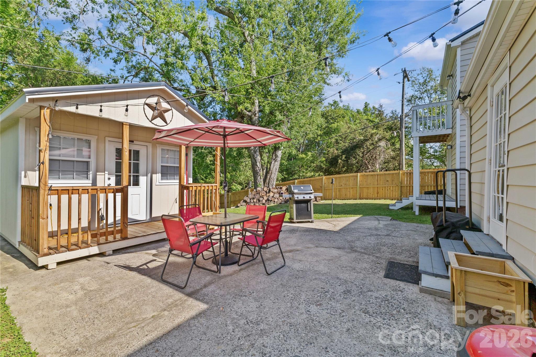 2341 Dixon Road Belmont, NC 28012 - Photo 10 of 42 a backyard of a house with yard and outdoor seating