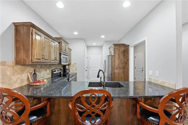 $295,000 | 14812 Ashmont Lane, Smithville, MO 64089