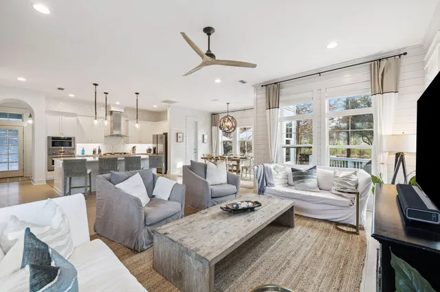 a bathroom with a bathtub a sink a mirror and a shower