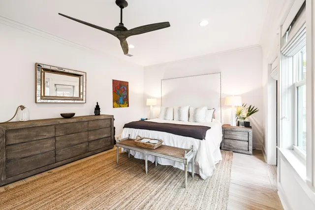 a balcony with wooden fence and trees