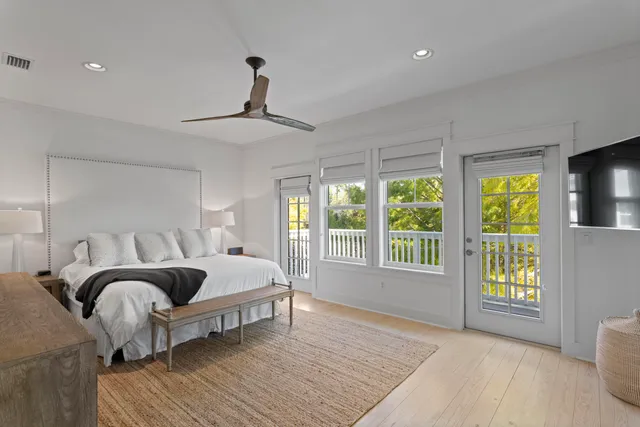 a bedroom with a bed and a couch