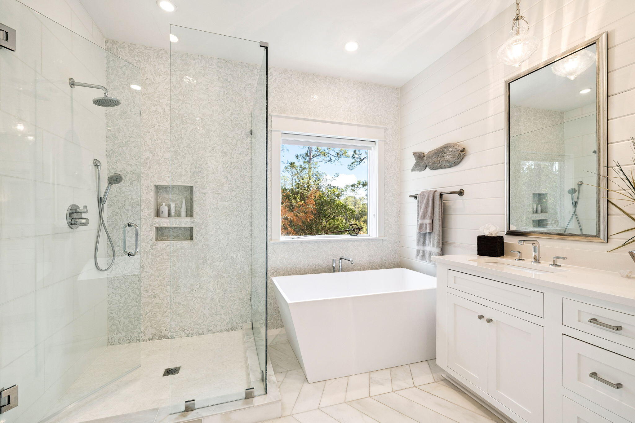 318 East Royal Fern Way Santa Rosa Beach, FL 32459 - Photo 18 of 43 a bathroom with a bathtub a sink a mirror and a shower