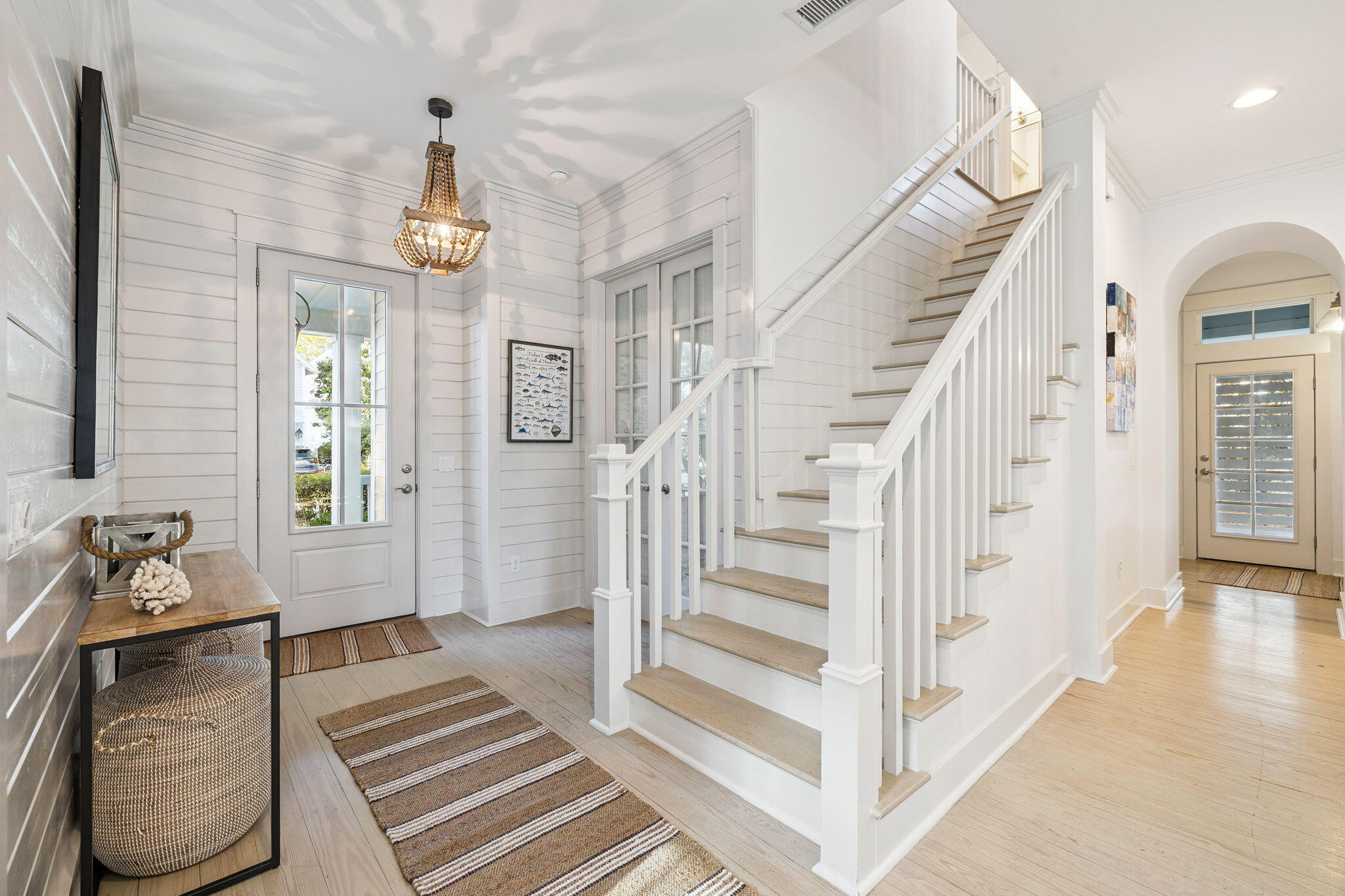 318 East Royal Fern Way Santa Rosa Beach, FL 32459 - Photo 2 of 43 a view of entryway and hall with wooden floor
