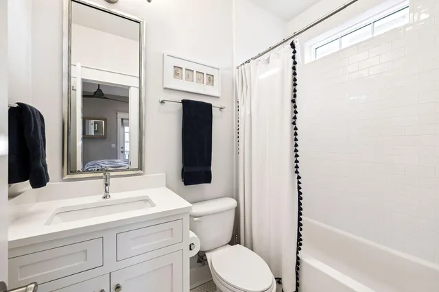 a utility room with sink dryer and washer