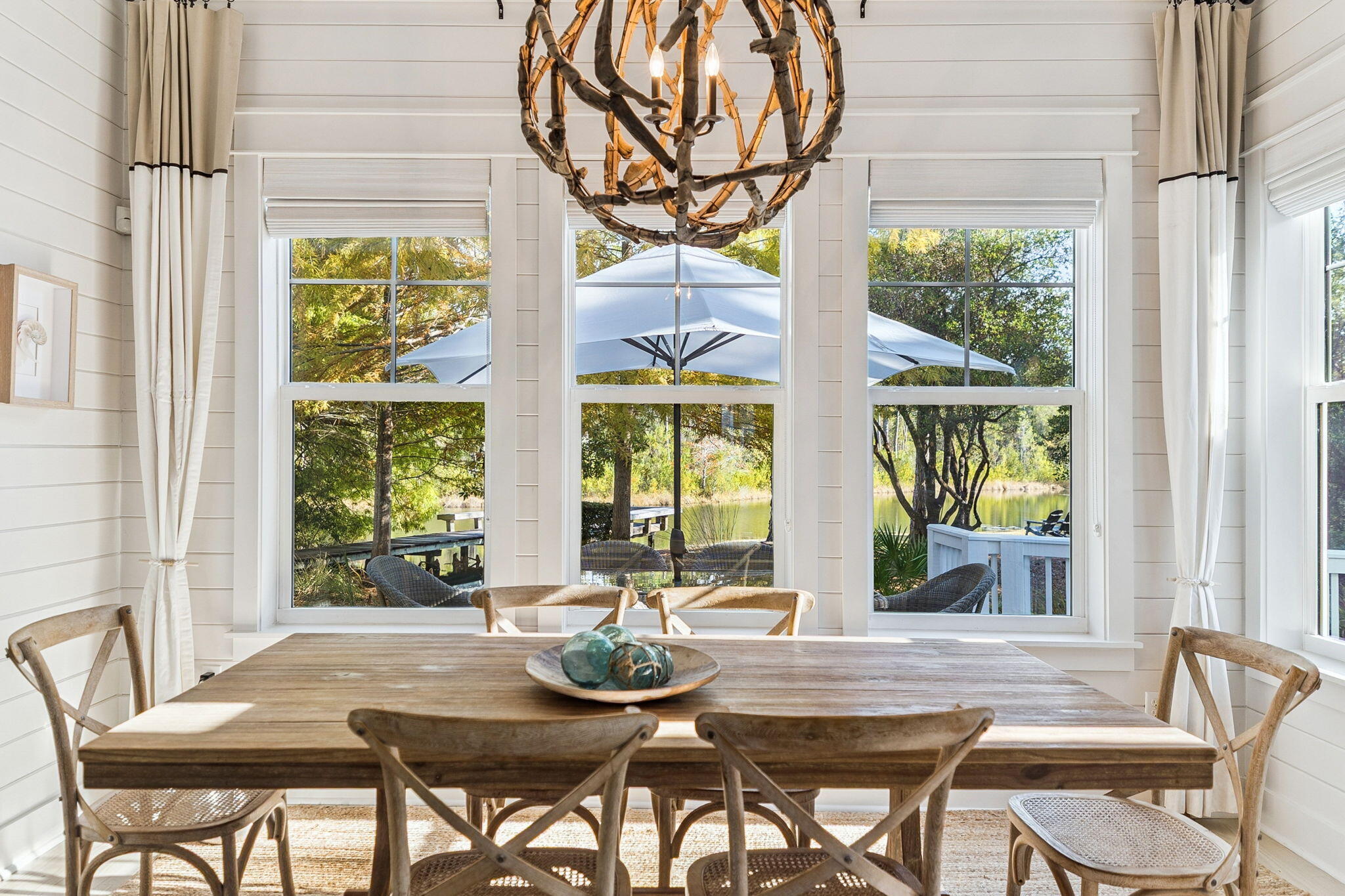 318 East Royal Fern Way Santa Rosa Beach, FL 32459 - Photo 5 of 43 a view of a dining room with furniture a rug and wooden floor
