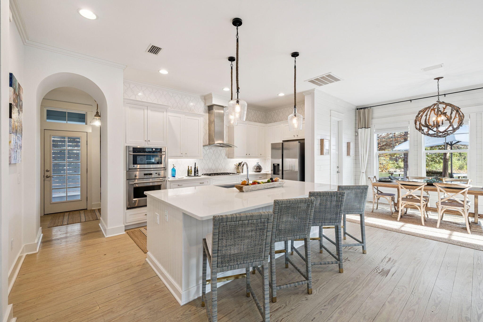 318 East Royal Fern Way Santa Rosa Beach, FL 32459 - Photo 8 of 43 a large kitchen with a table and chairs