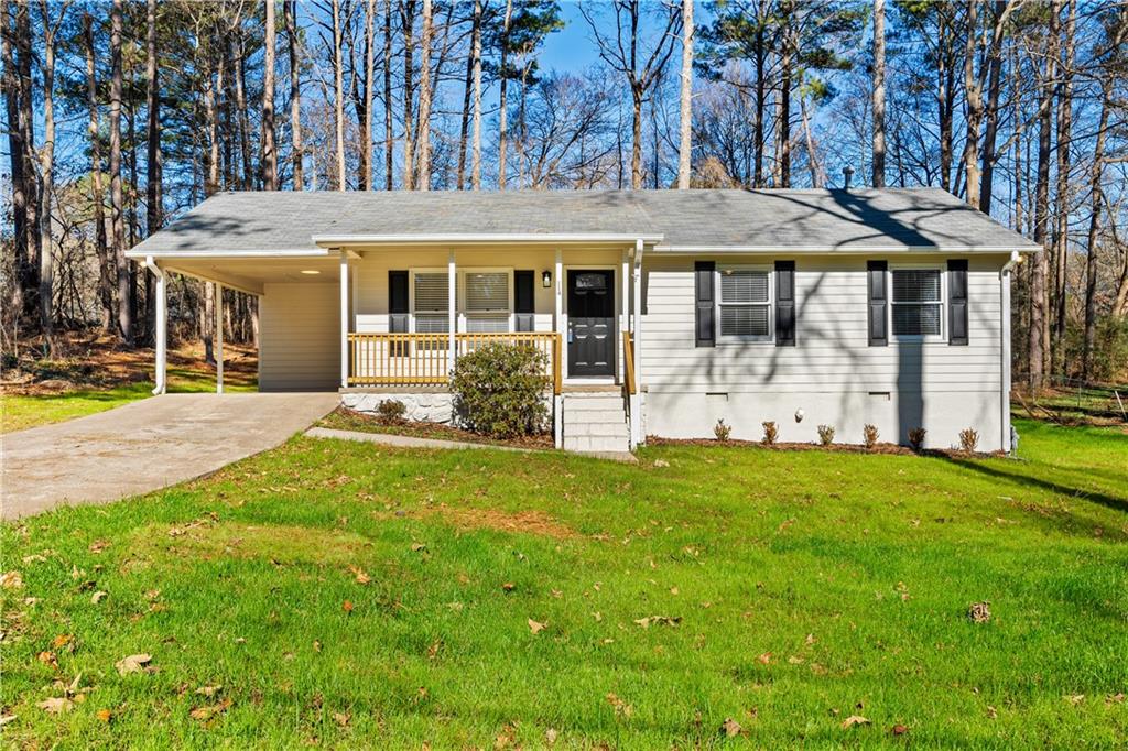 114 Vincent Avenue Stockbridge, GA 30281 - Photo 1 of 23 front view of a house with a yard