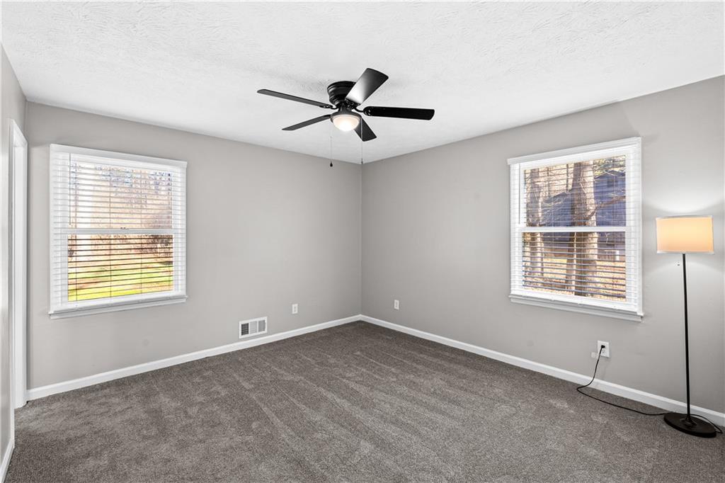 114 Vincent Avenue Stockbridge, GA 30281 - Photo 15 of 23 a view of an empty room with a window