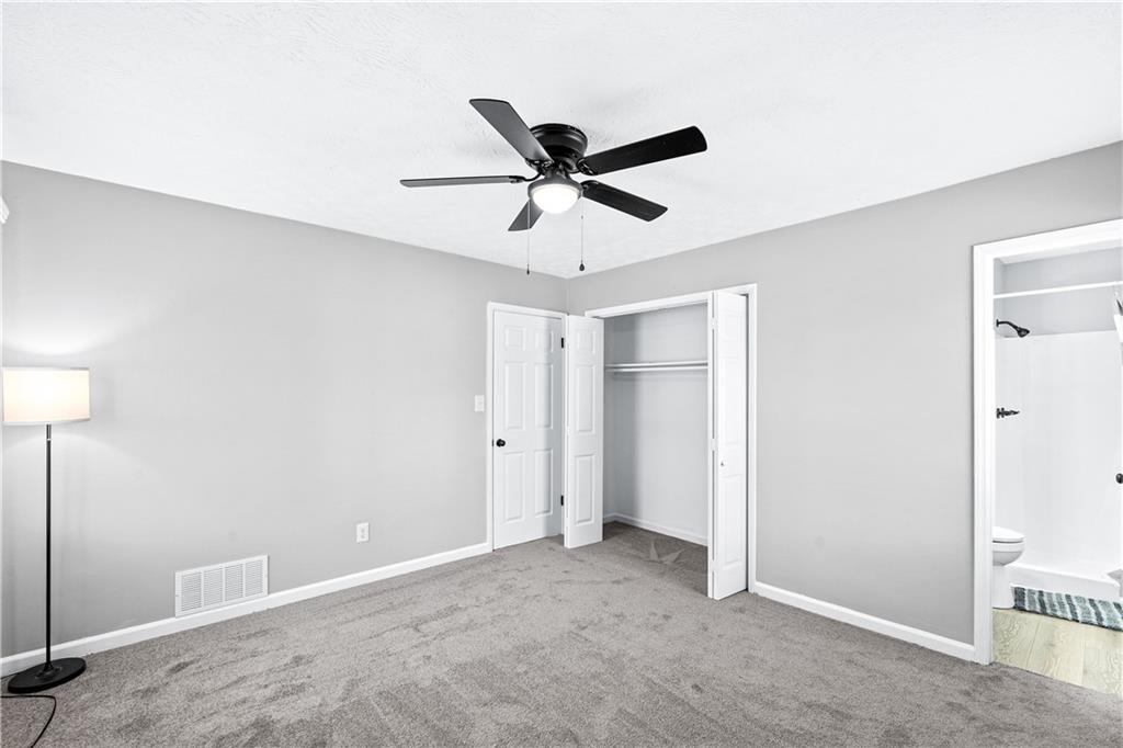 114 Vincent Avenue Stockbridge, GA 30281 - Photo 16 of 23 a view of a ceiling fan in a room