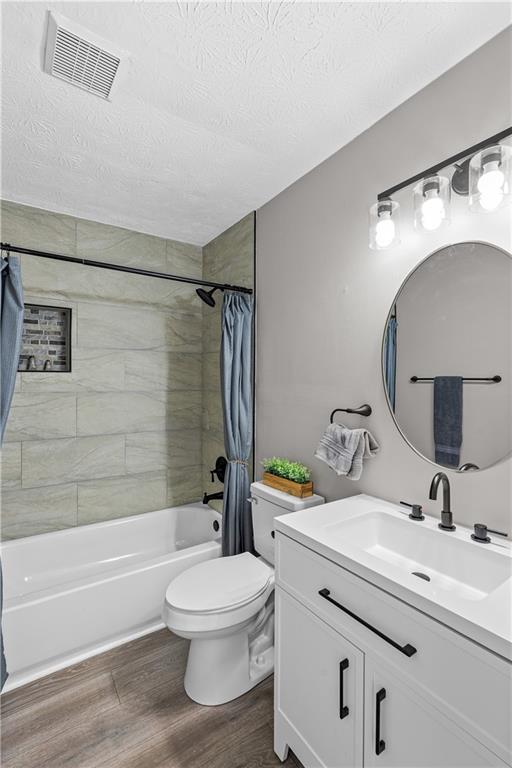 114 Vincent Avenue Stockbridge, GA 30281 - Photo 20 of 23 a bathroom with a sink toilet and shower