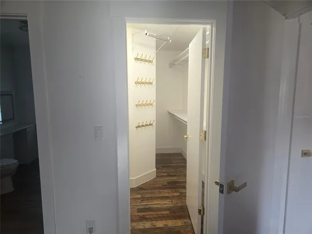 a view of a bathroom from a hallway