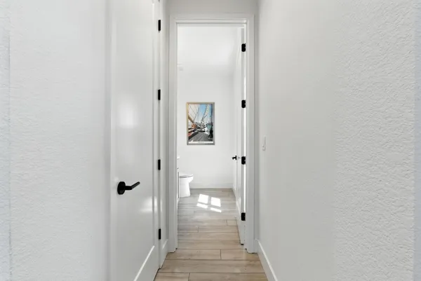 a bedroom with a bed and a fireplace