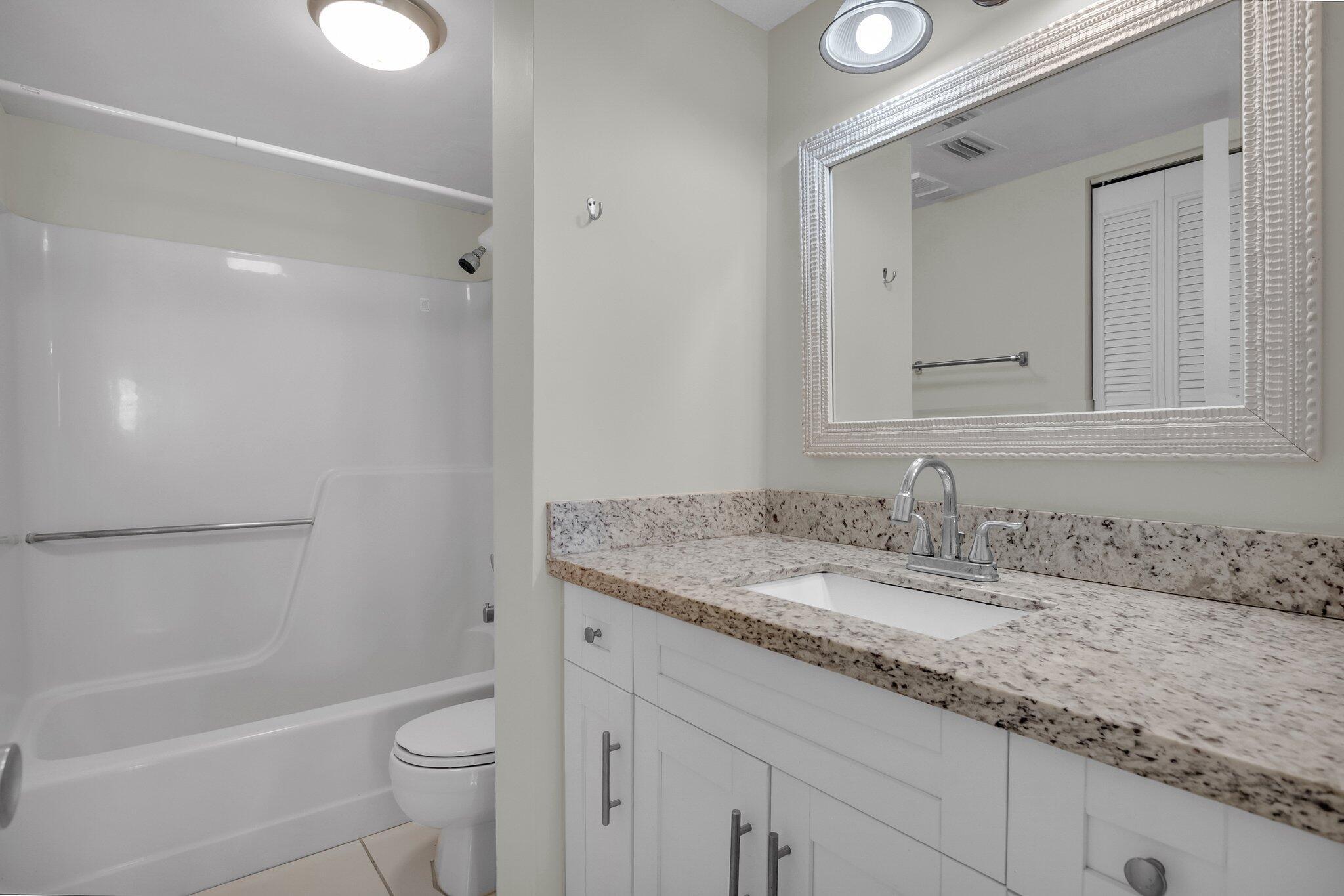 21911 Lake Forest Circle, Unit 103 Boca Raton, FL 33433 - Photo 20 of 24 Master bathroom