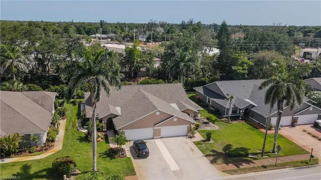 an aerial view of a house with a garden