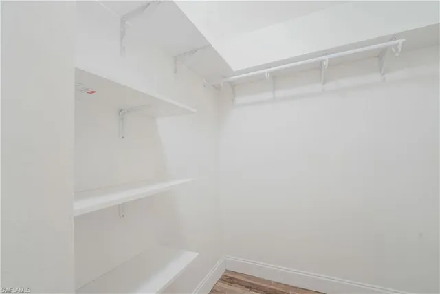 a view of an empty walk in closet