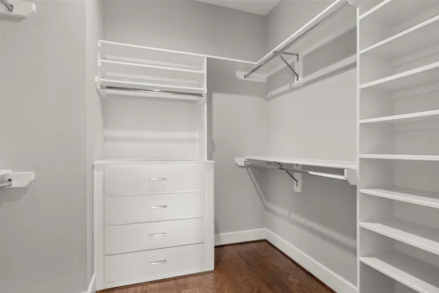 a view of an empty walk in closet