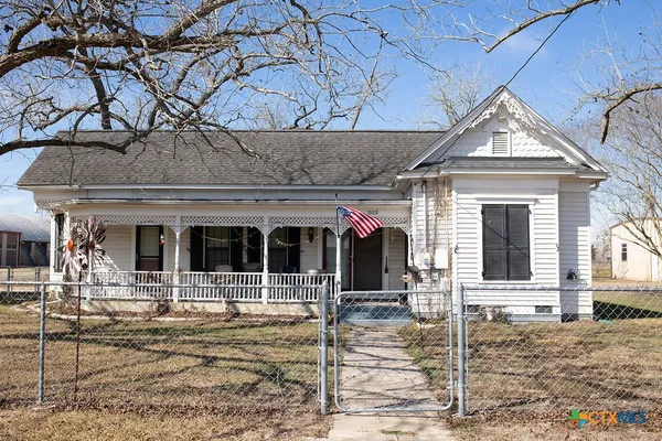 a view of a house with small porch