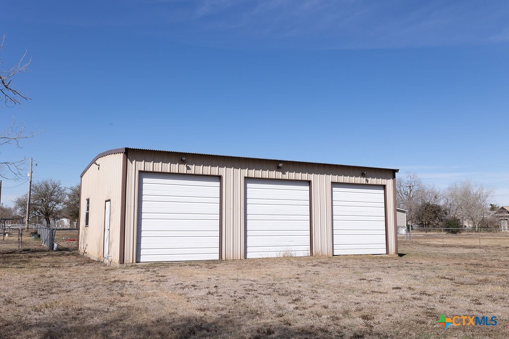 202 East 4th Street Nordheim, TX 78141 - Photo 14 of 18 a view of a house with a yard