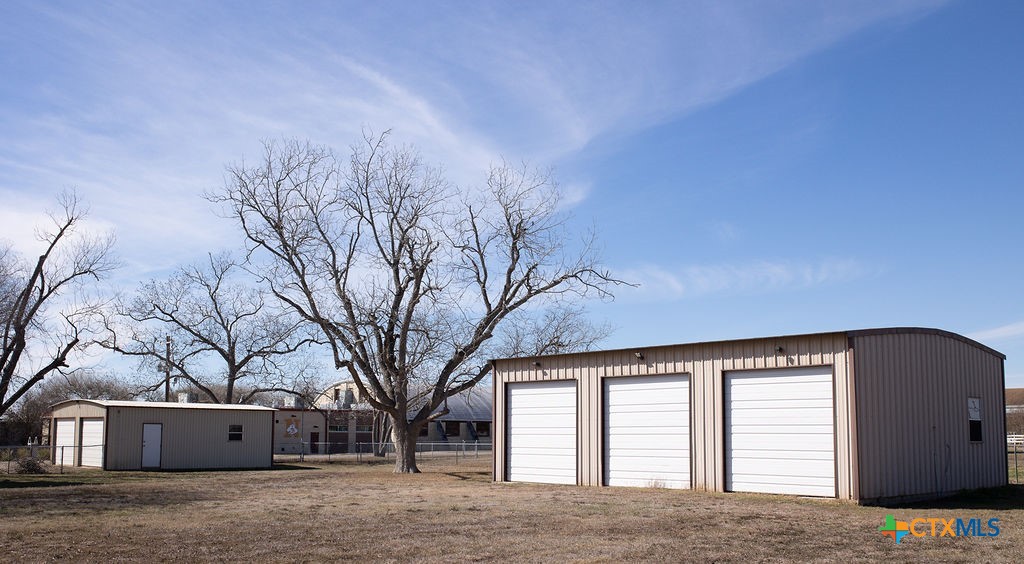 202 East 4th Street Nordheim, TX 78141 - Photo 15 of 18 a view of house with a snow in the yard