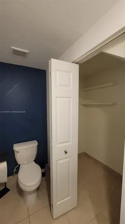 a bathroom with a toilet