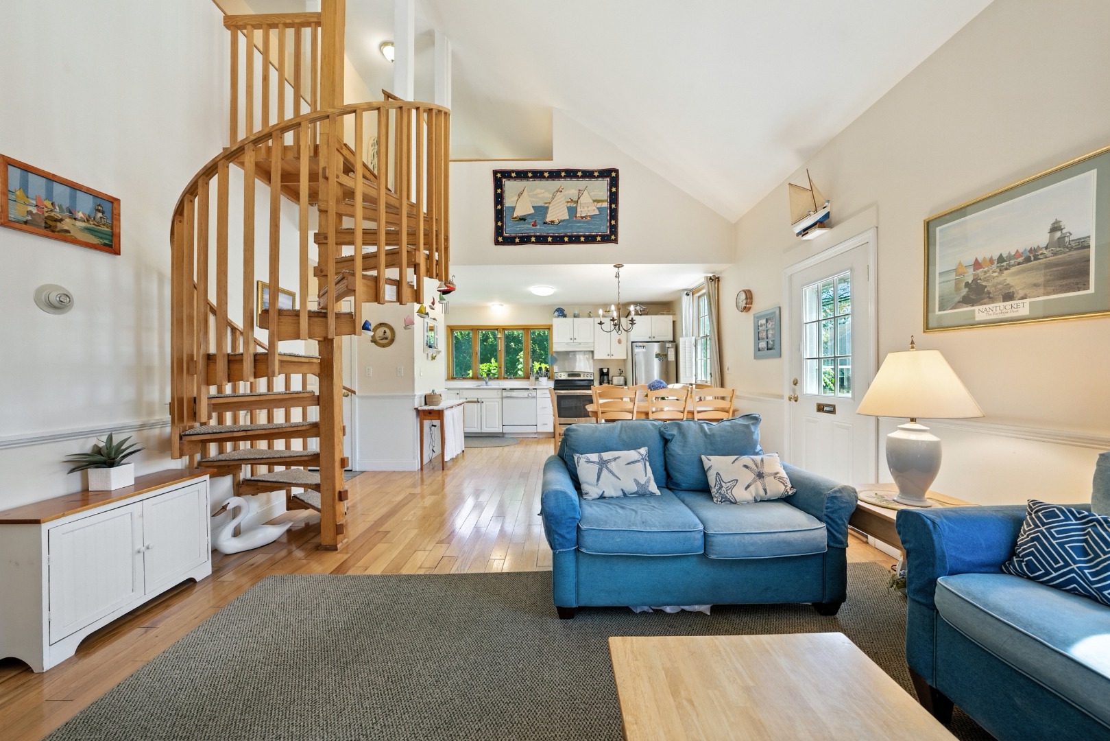 52 Pleasant Street Nantucket, MA 02554 - Photo 6 of 36 a living room with furniture and a large window