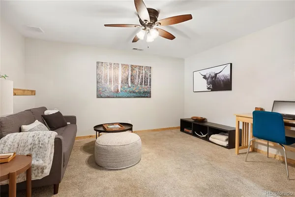 a bedroom with furniture and a couch