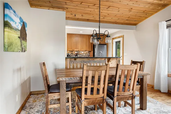 a view of a dining room with furniture