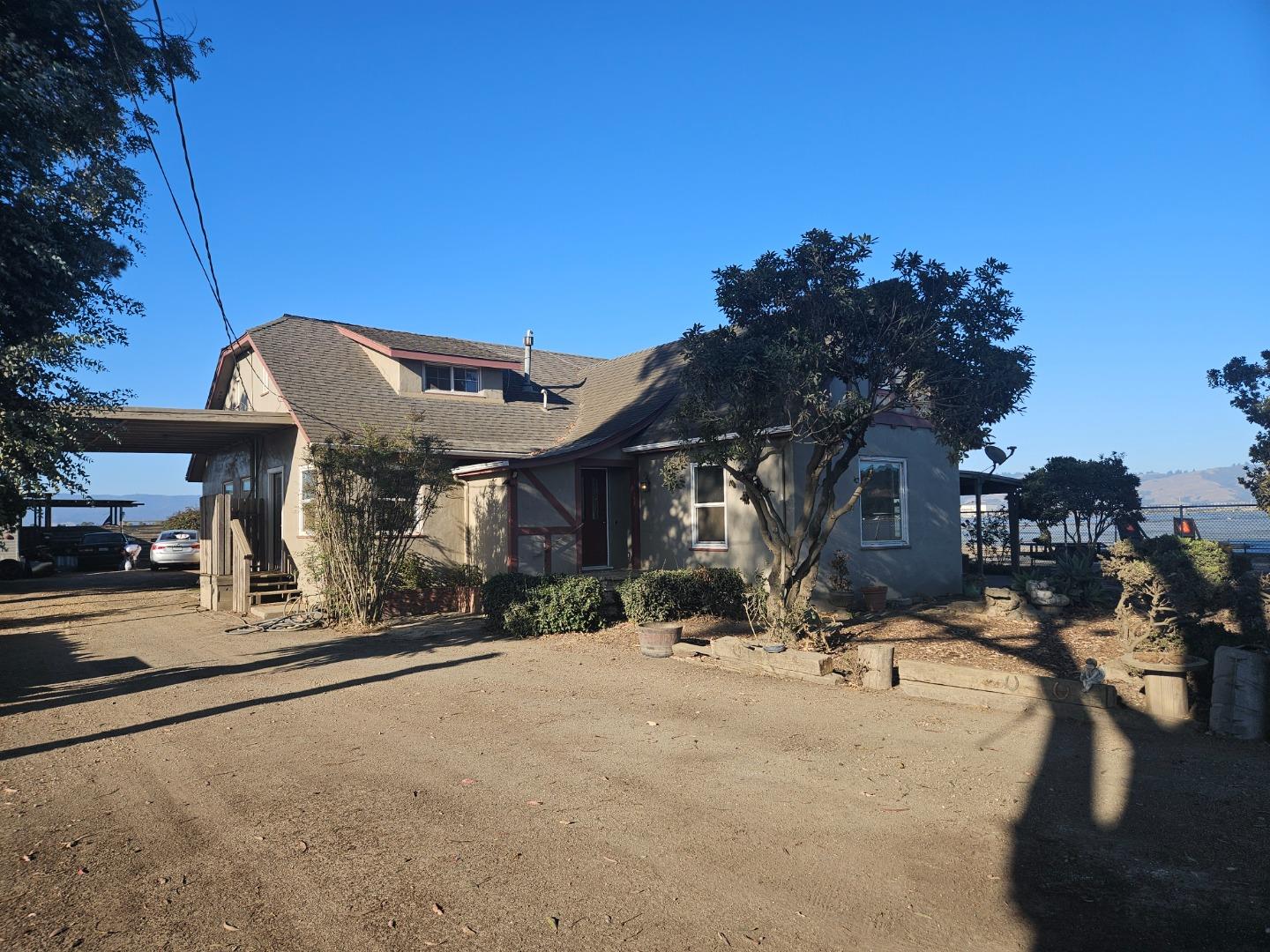 120 Trafton Road Watsonville, CA 95076 - Photo 2 of 43 a front view of a house with a yard