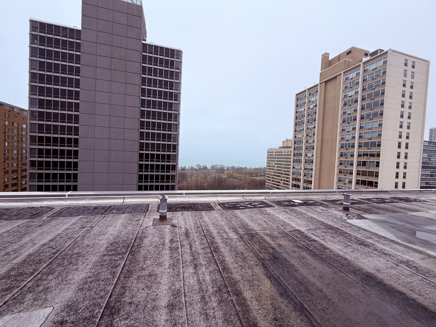 3033 North Sheridan Road, Unit 809 Chicago, IL 60657 - Photo 11 of 20 a view of a building with a street