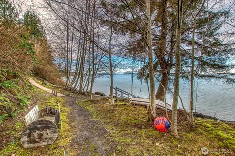 a view of a backyard of the house