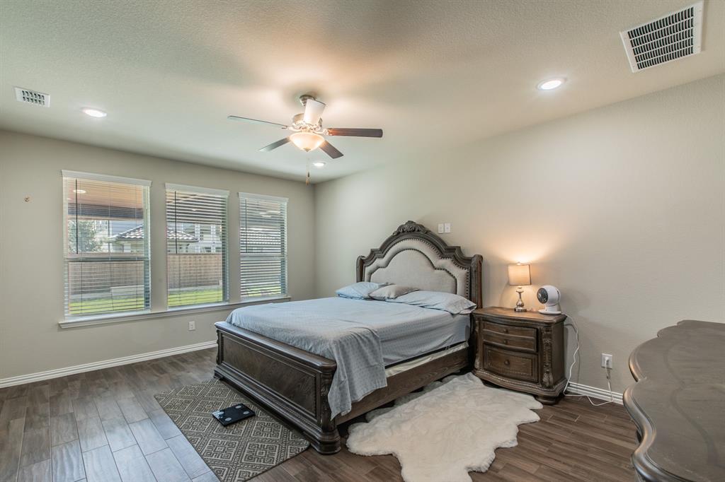 2521 Maidenhair Road Frisco, TX 75033 - Photo 8 of 39 Spacious room featuring wood-finish flooring, recessed lighting, and a ceiling fan