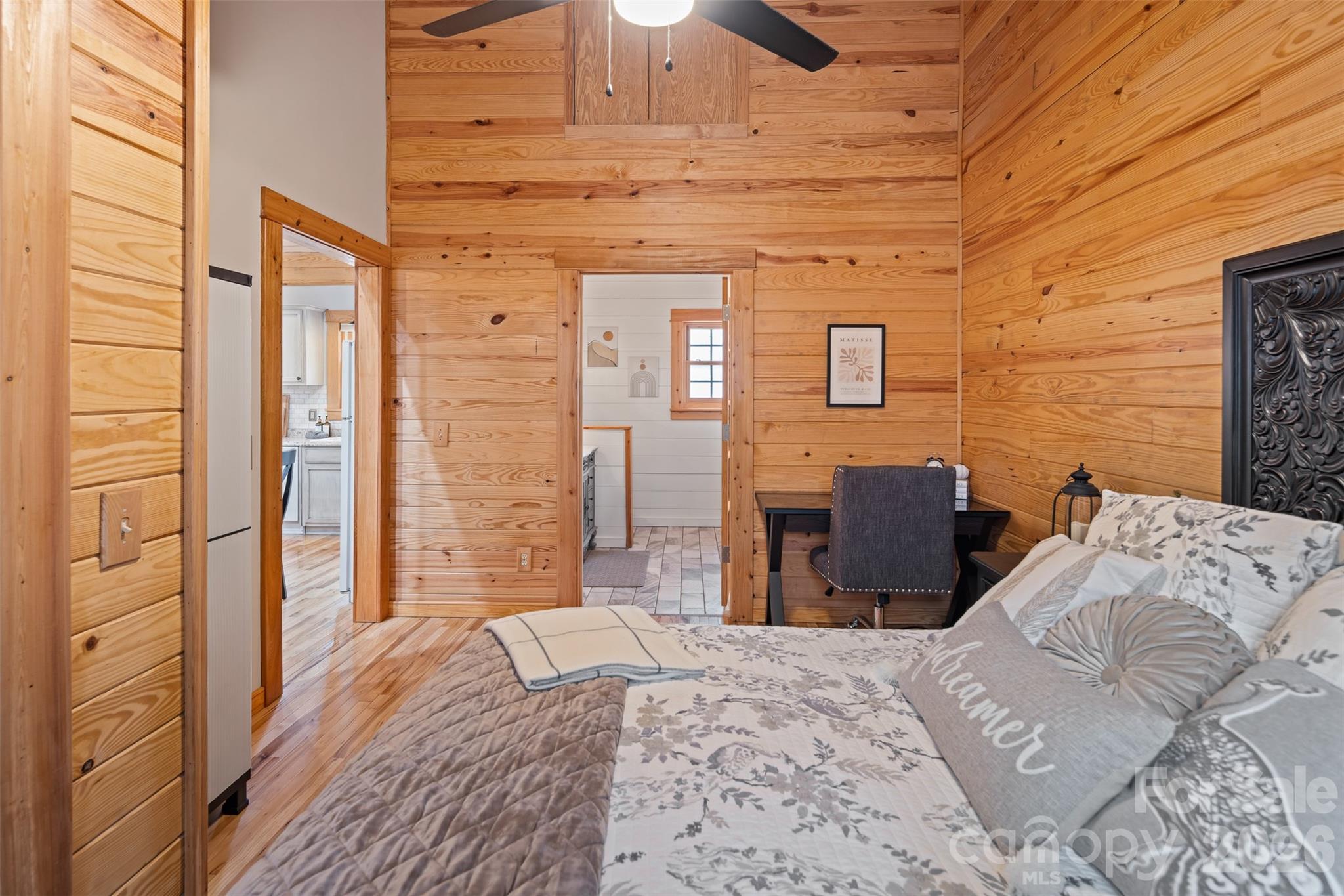 1333 Park Vista Road West Jefferson, NC 28694 - Photo 19 of 39 a bedroom with a bed and wooden floor