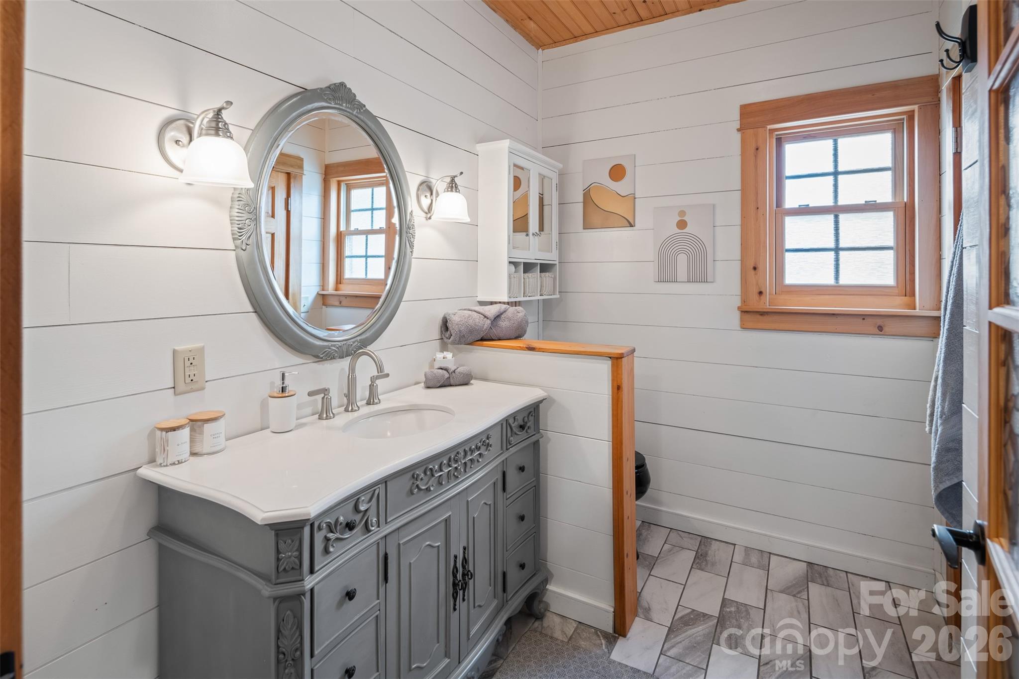 1333 Park Vista Road West Jefferson, NC 28694 - Photo 20 of 39 a bathroom with a sink and a mirror