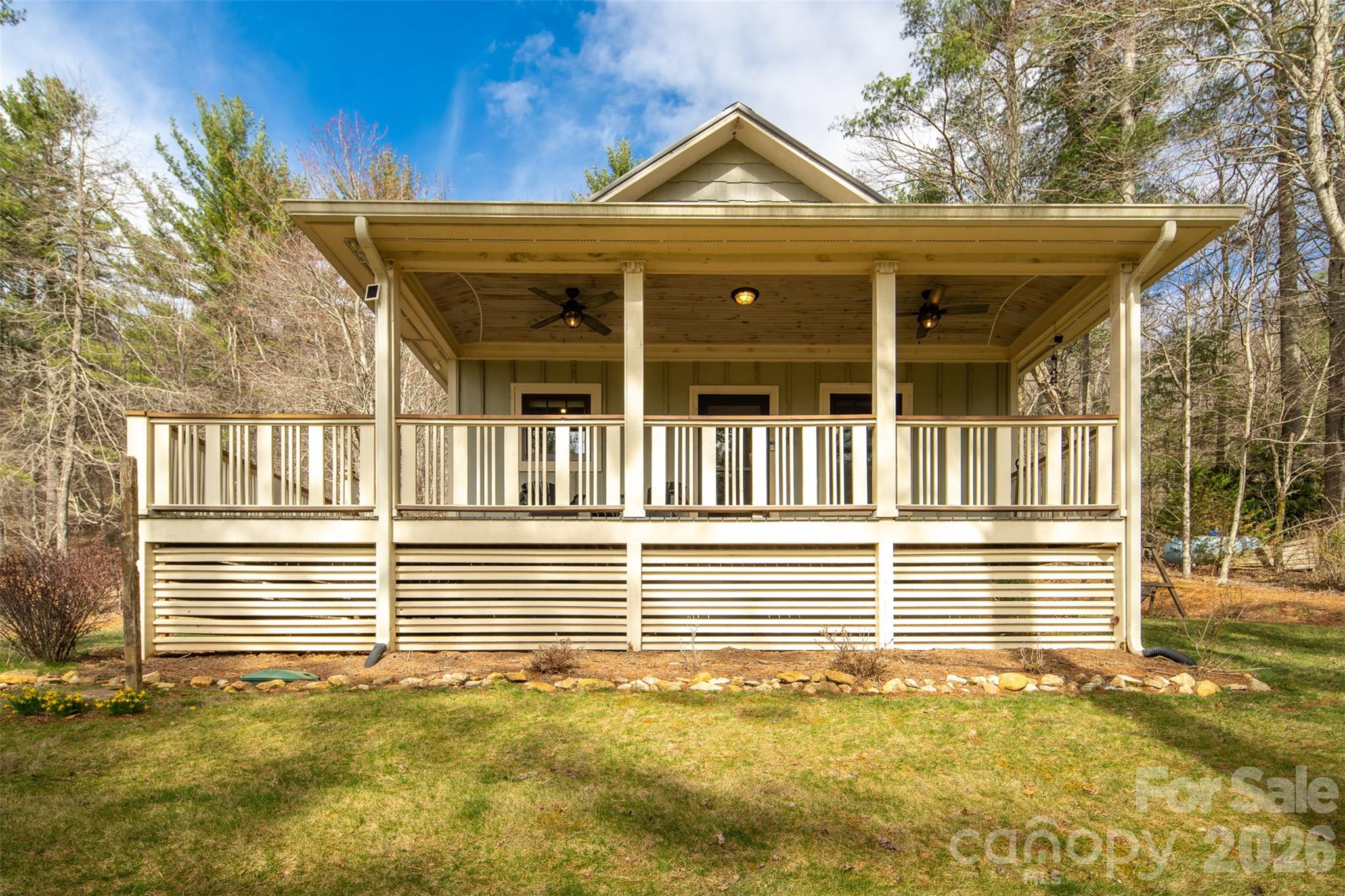 1333 Park Vista Road West Jefferson, NC 28694 - Photo 2 of 39 a view of a house with a small yard and wooden fence