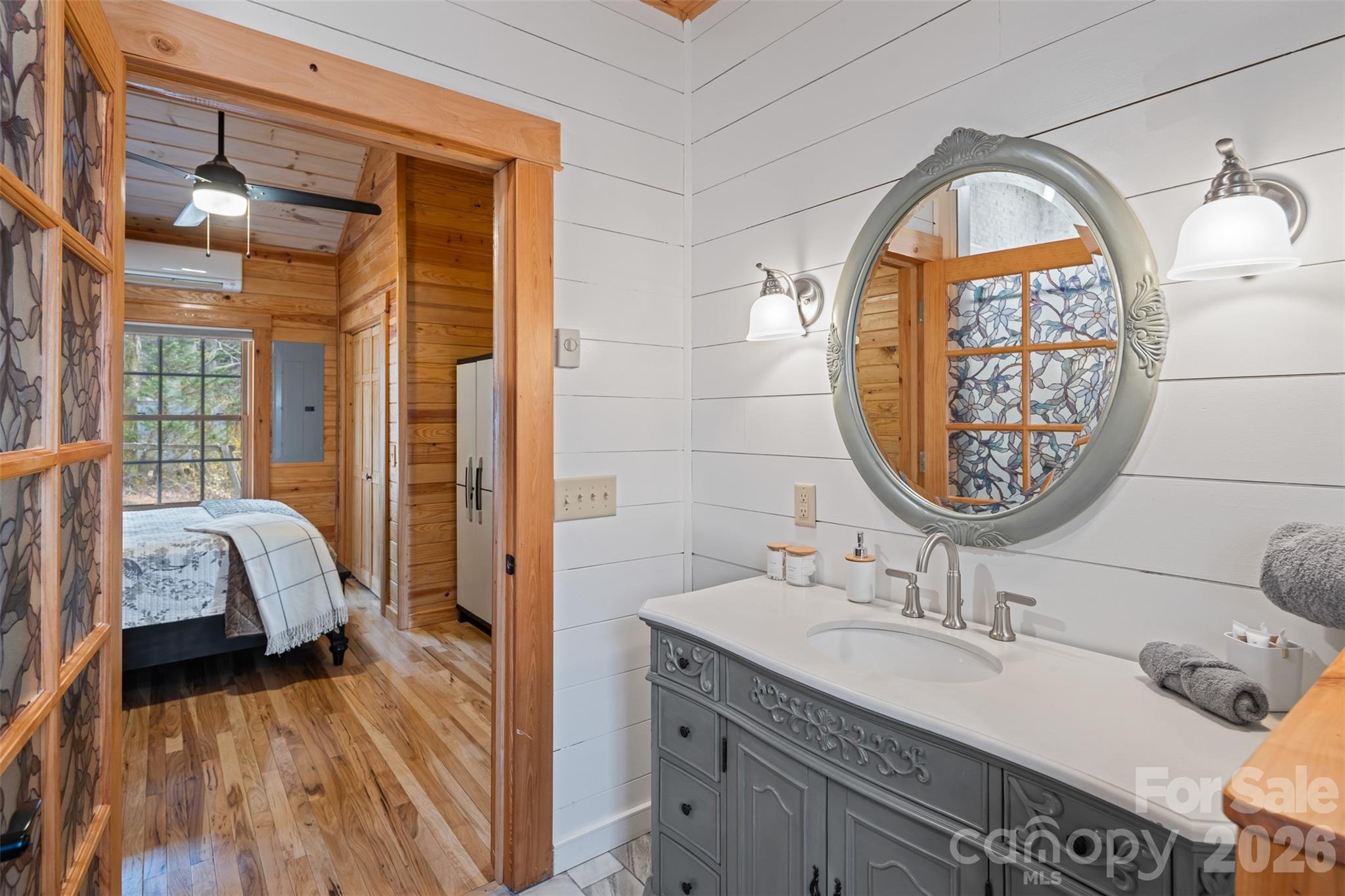 1333 Park Vista Road West Jefferson, NC 28694 - Photo 25 of 39 a en suite bathroom with a sink and a mirror
