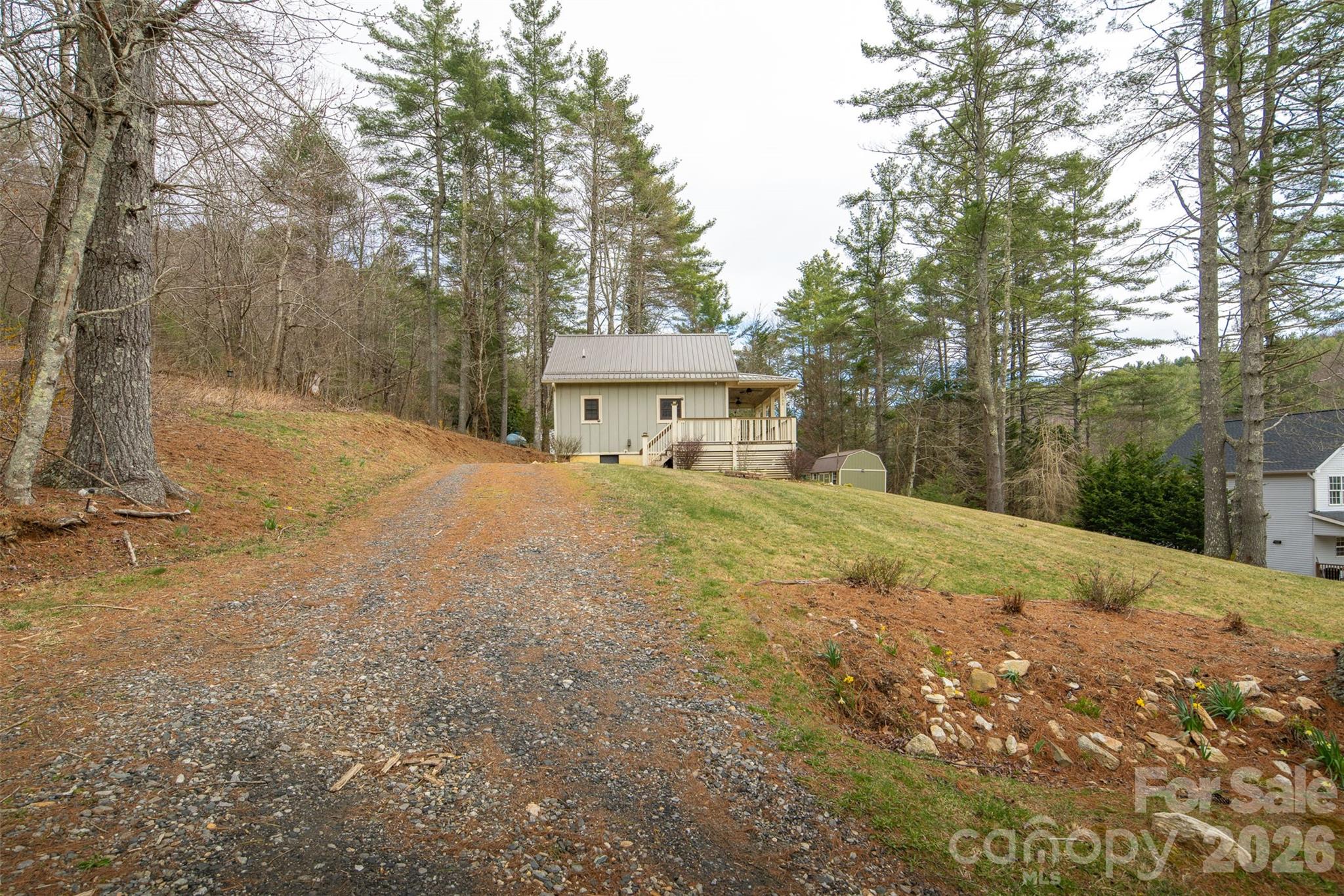 1333 Park Vista Road West Jefferson, NC 28694 - Photo 26 of 39 a house with trees in front of it