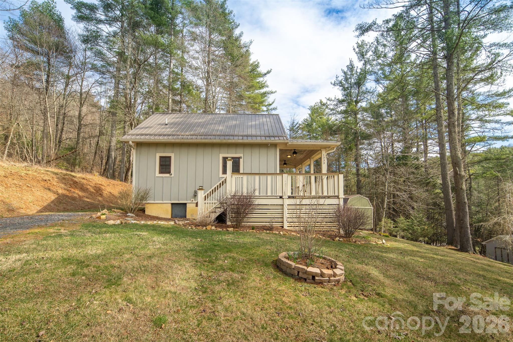 1333 Park Vista Road West Jefferson, NC 28694 - Photo 27 of 39 a front view of a house with a yard