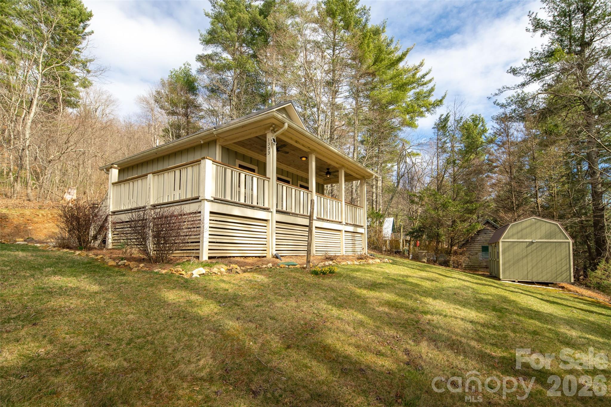 1333 Park Vista Road West Jefferson, NC 28694 - Photo 36 of 39 a front view of a house with a yard
