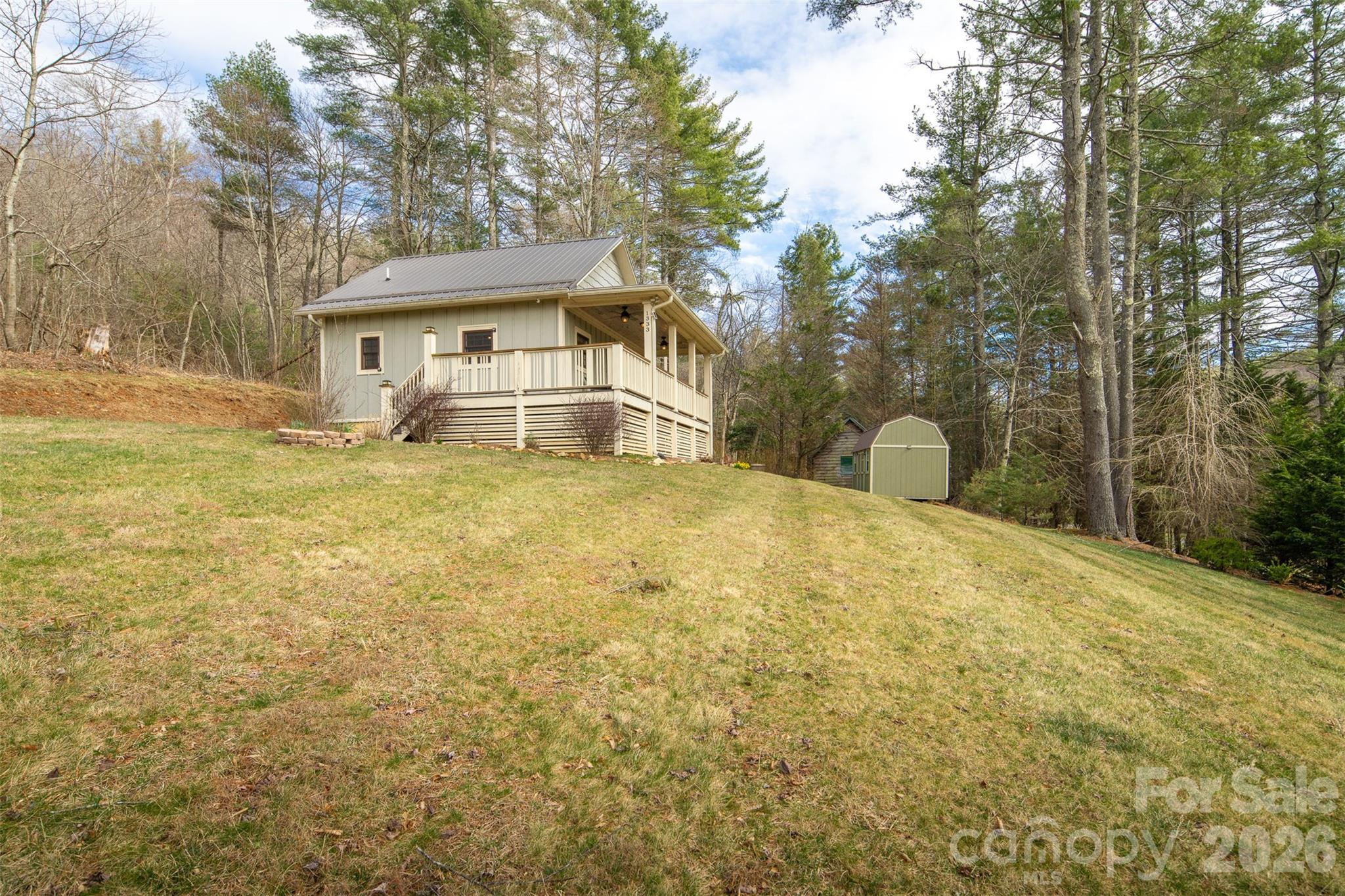 1333 Park Vista Road West Jefferson, NC 28694 - Photo 37 of 39 a view of a house with a yard