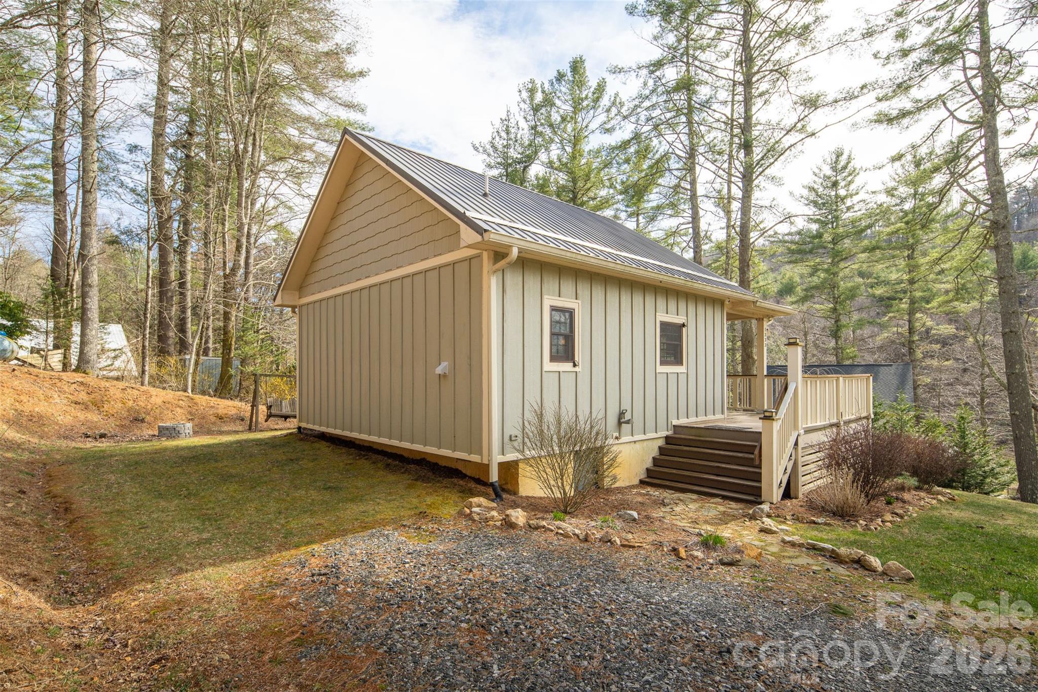 1333 Park Vista Road West Jefferson, NC 28694 - Photo 4 of 39 a view of a house with backyard and trees