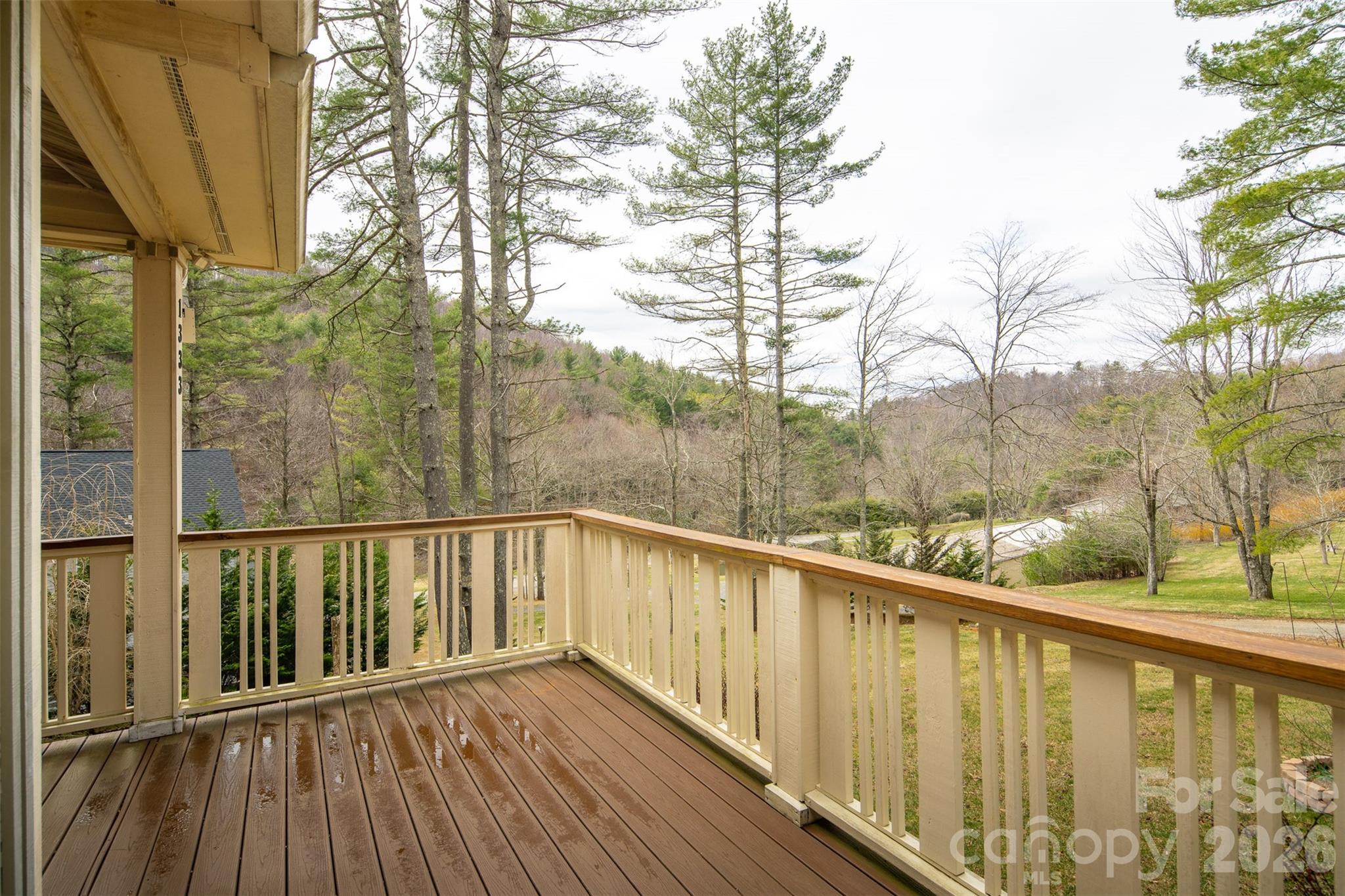 1333 Park Vista Road West Jefferson, NC 28694 - Photo 6 of 39 a view of a balcony with wooden floor and fence