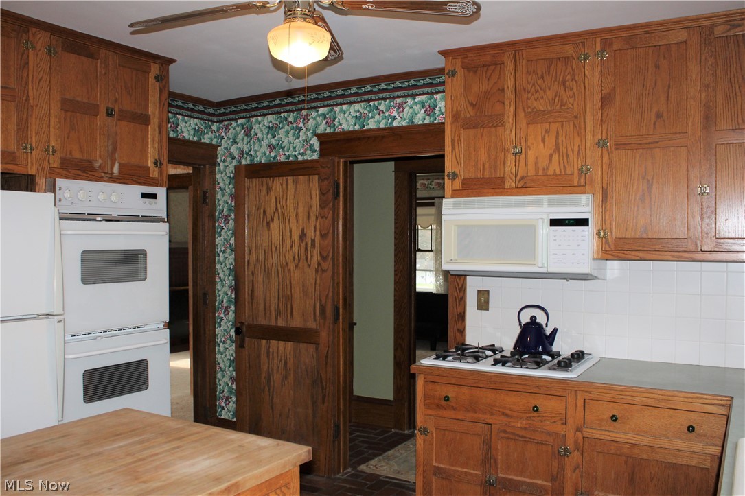 3904 Kent Road Stow, OH 44224 - Photo 31 of 35 Kitchen features double ovens, built in microwave and plenty of storage. All appliances convey