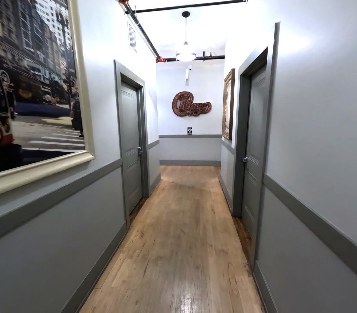 1432 West 21st Street, Unit 321 Chicago, IL 60608 - Photo 19 of 25 a view of a hallway and wooden floor